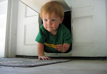 child using cat door